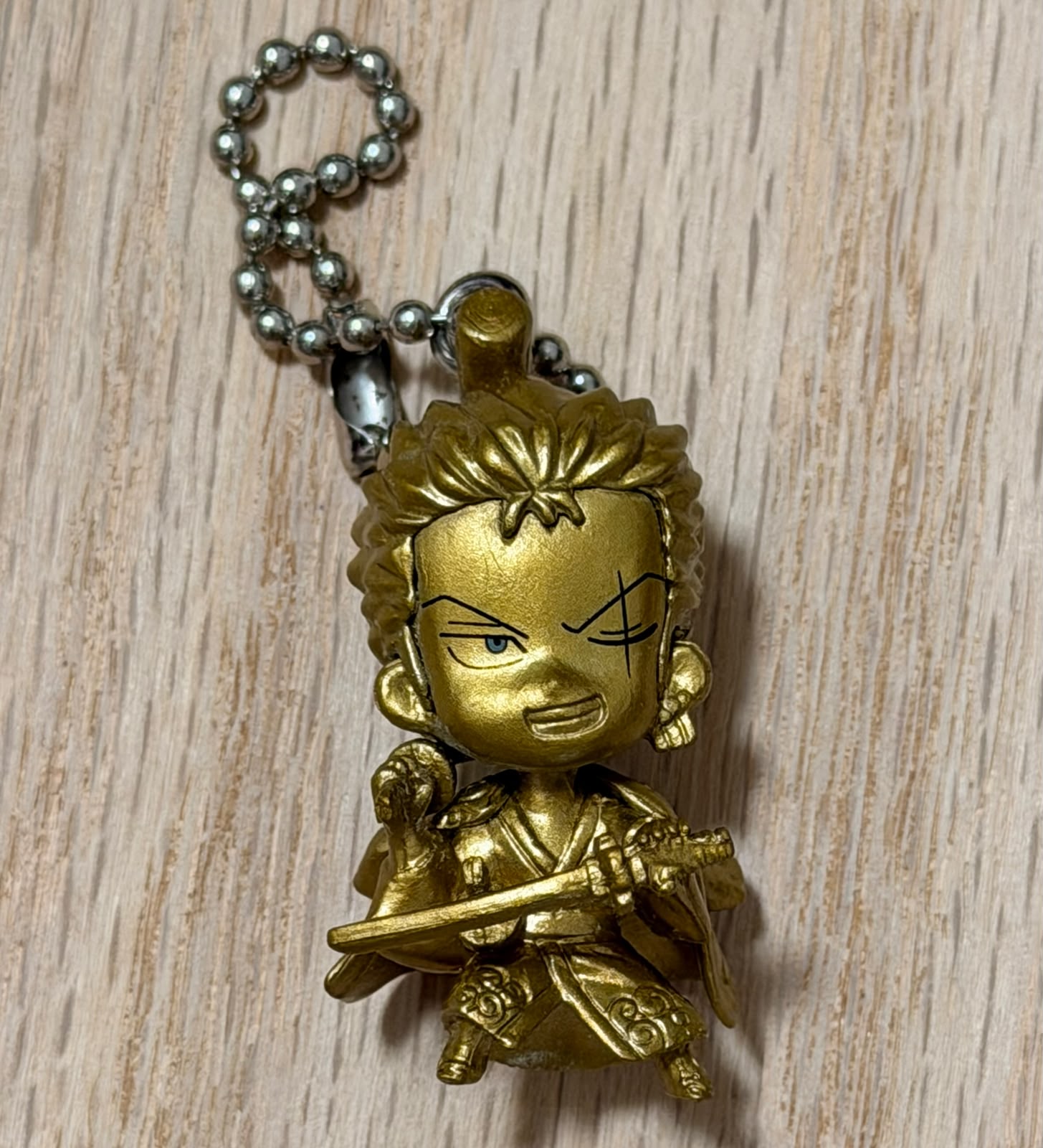 One Piece Zoro metallic gold mini figurine keychain