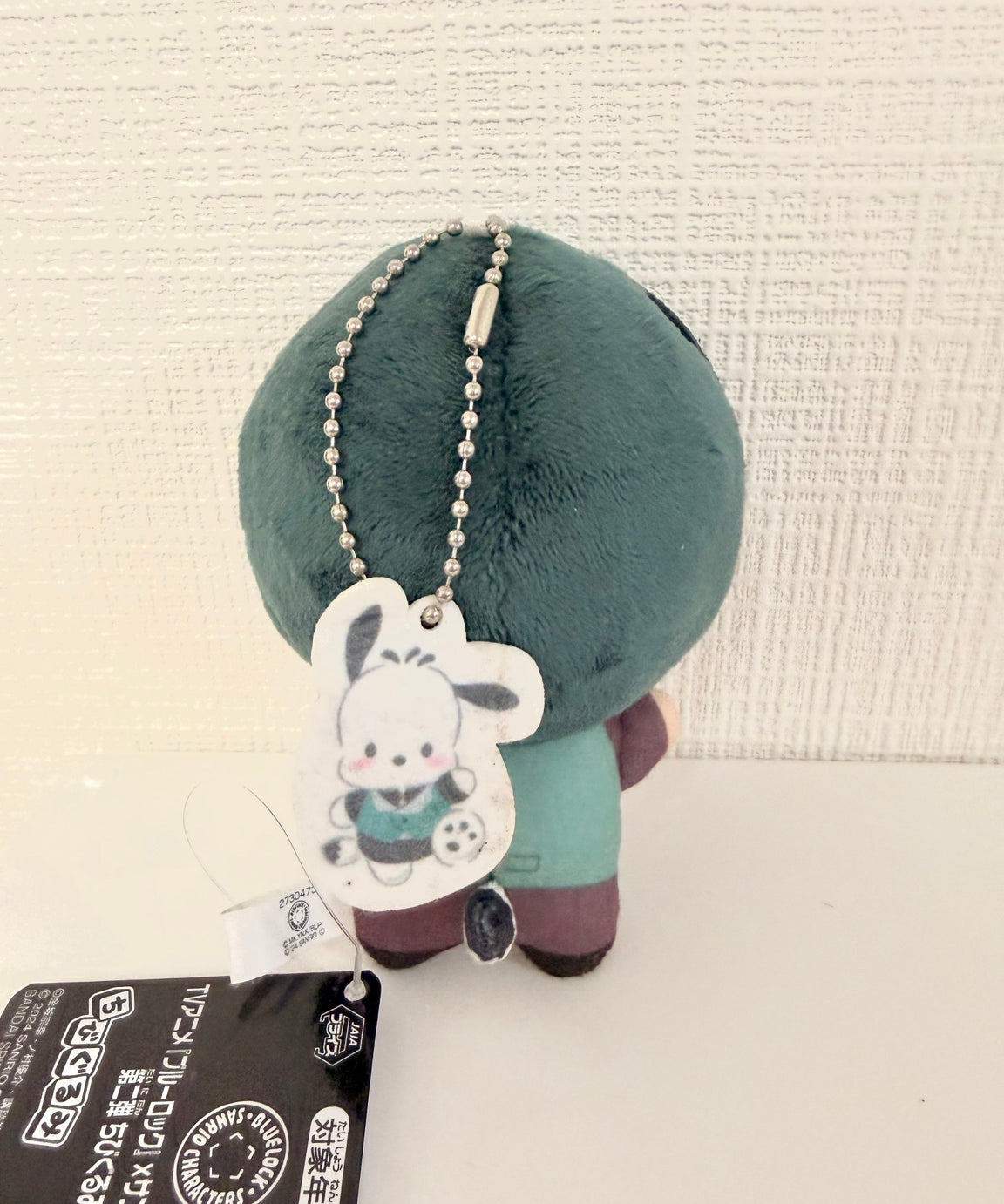Blue Lock Official Rin Plush Keychain JP Suit Version back