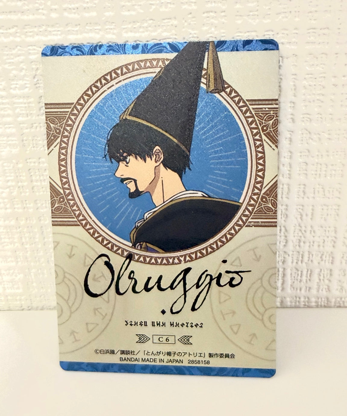 Witch Hat Atelier Olruggio collector card back